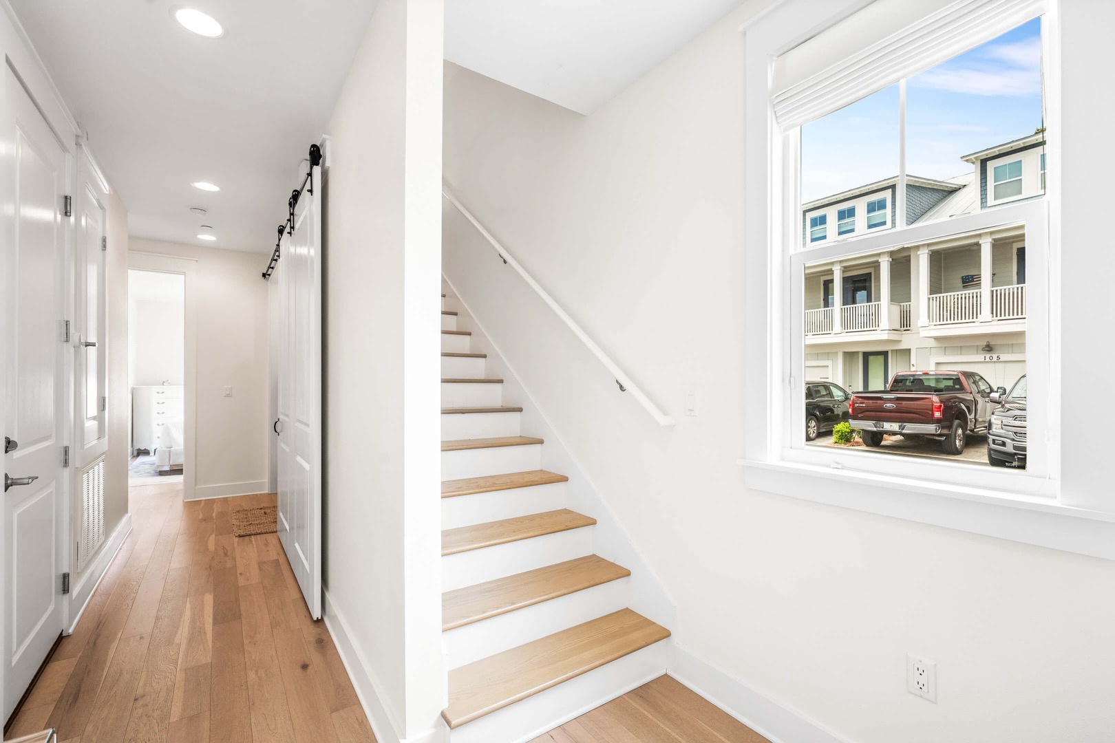 Stairs connecting the remaining bedroom and bunk space