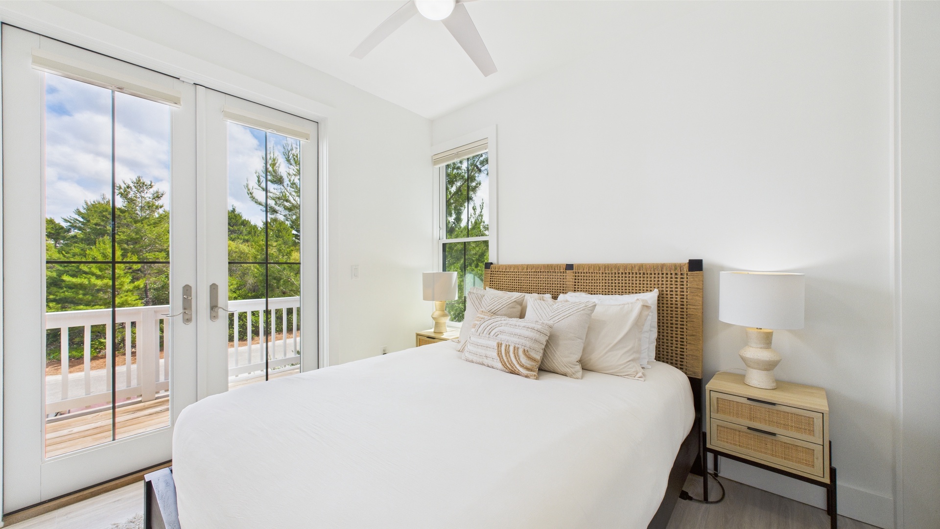 In Law suite above the garage-Bedroom with queen bed and balcony access