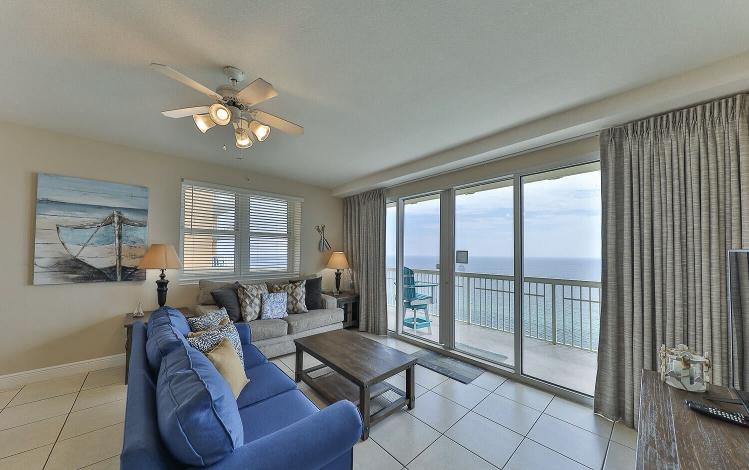 Open concept living area with sleeper sofa and gulf views