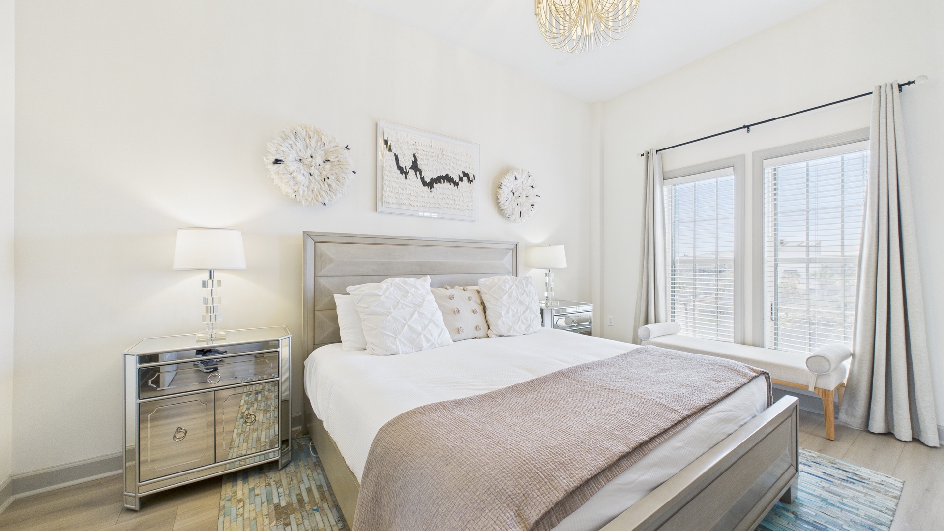 Master bedroom with king size bed and tv screen