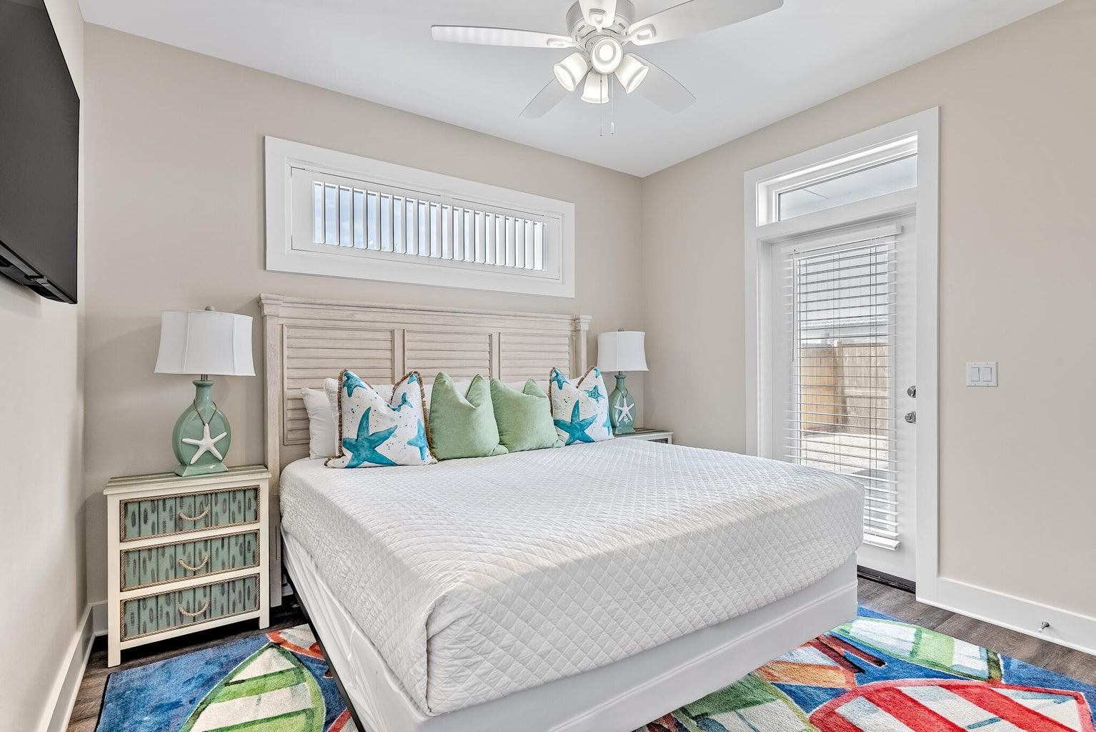 Bedroom with king bed TV and ensuite bathroom