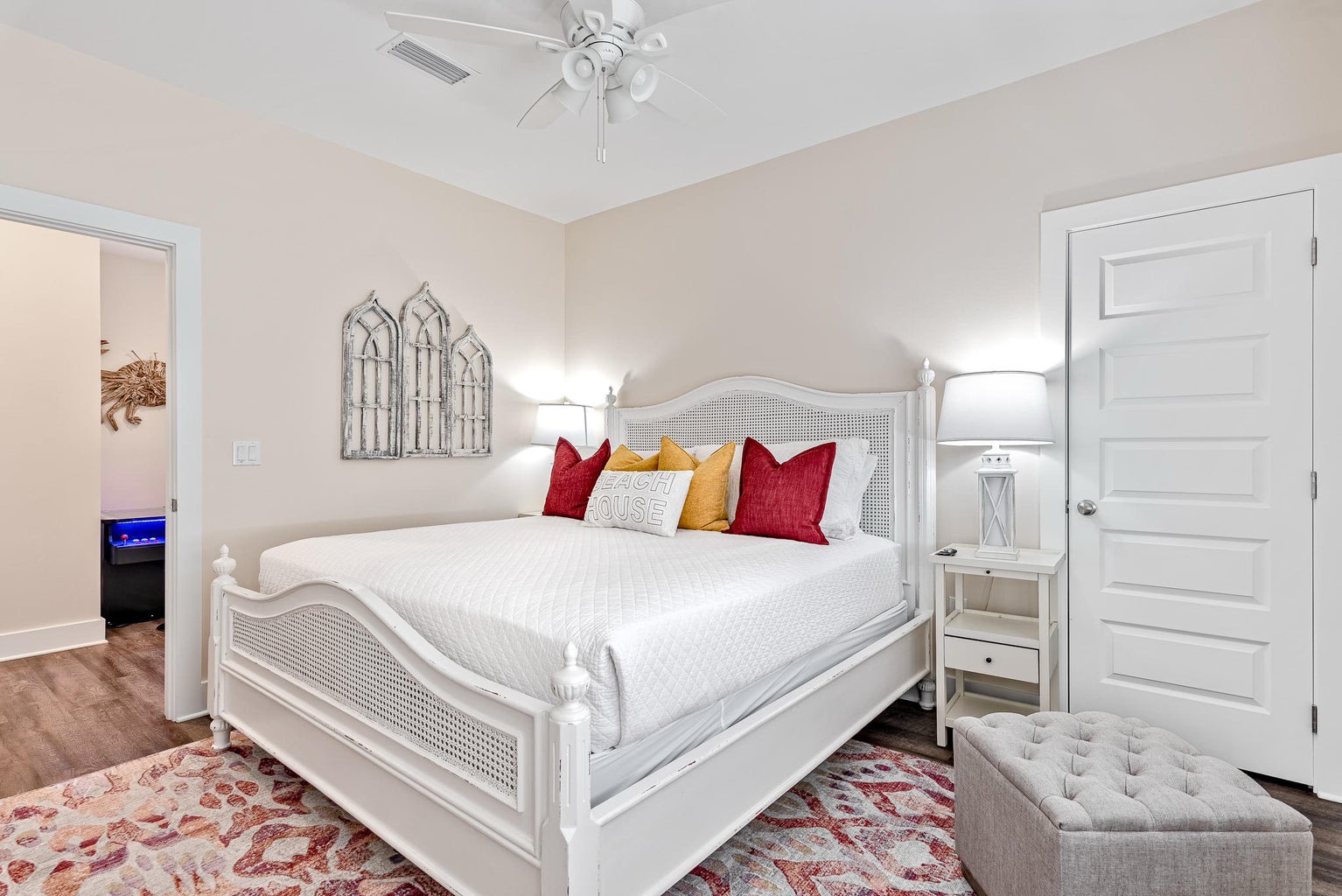 Primary bedroom with king bed and ensuite bathroom