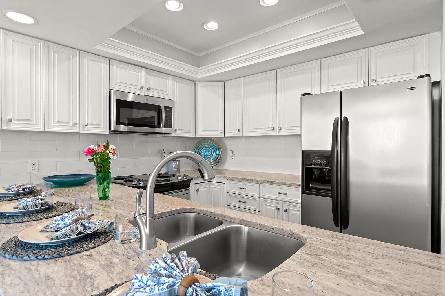Full kitchen with stainless steel appliances