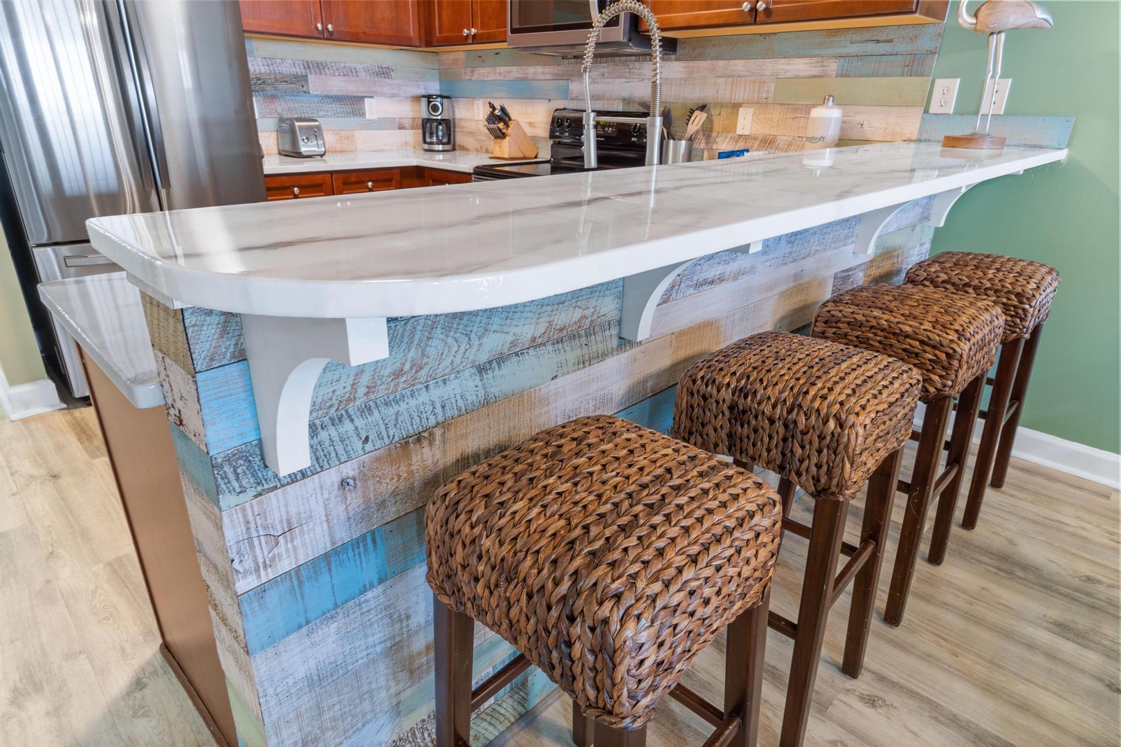 Kitchen area with bar seating