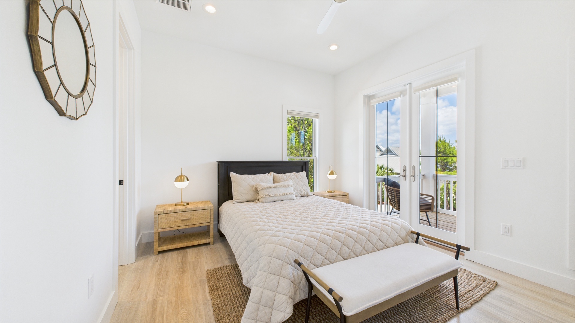 Third bedroom with queen bed TV and shared ensuite bathroom