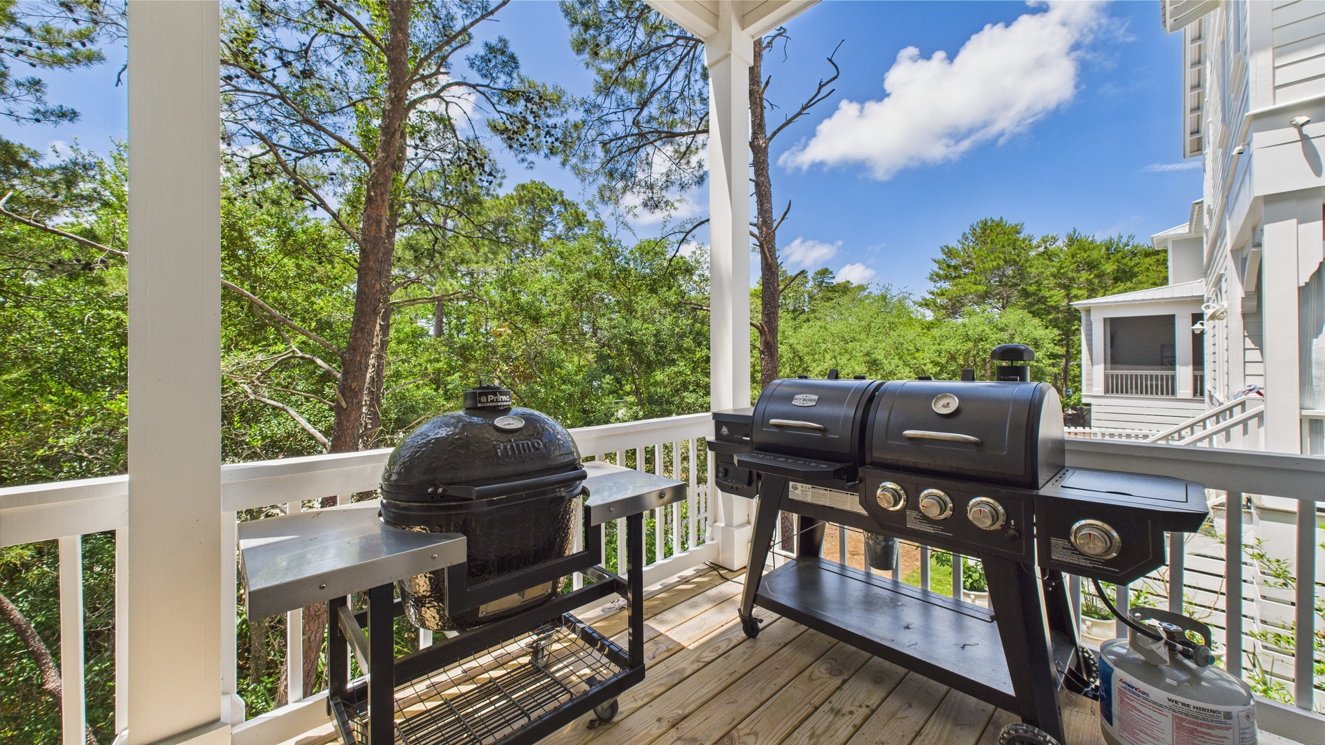 Terrace on first floor with dining table and grills