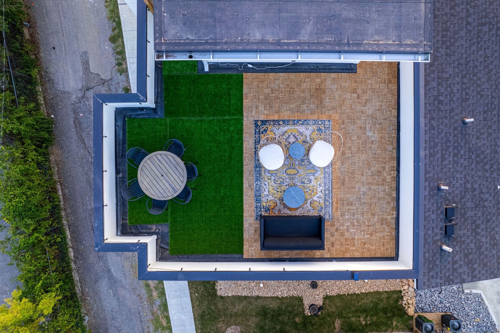 Private rooftop deck with ample seating and dining area