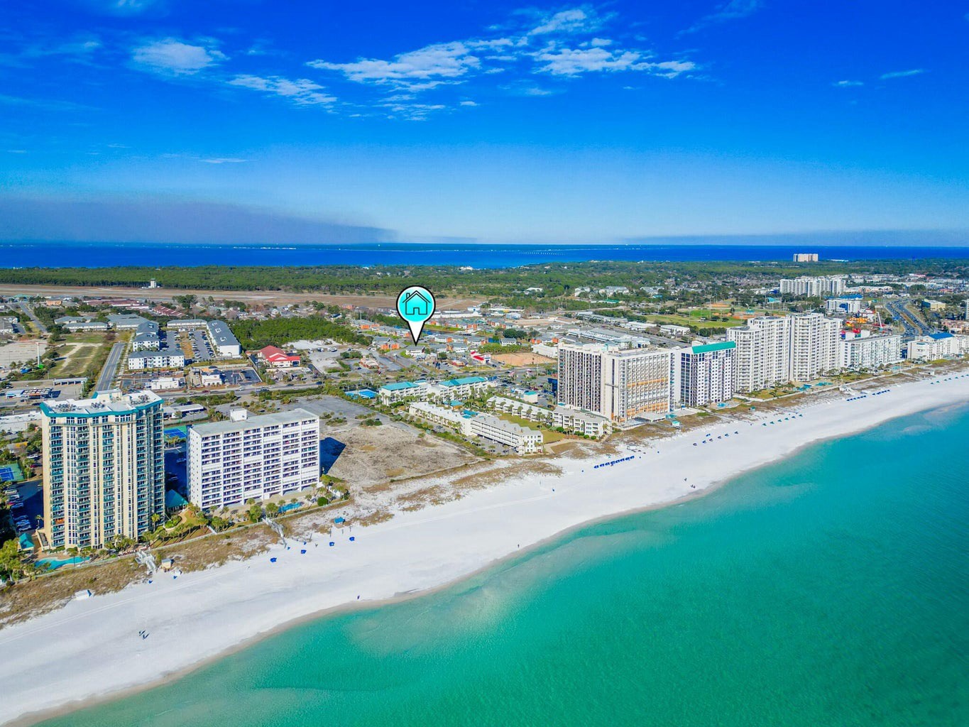 Coastal view of condos distance to beach