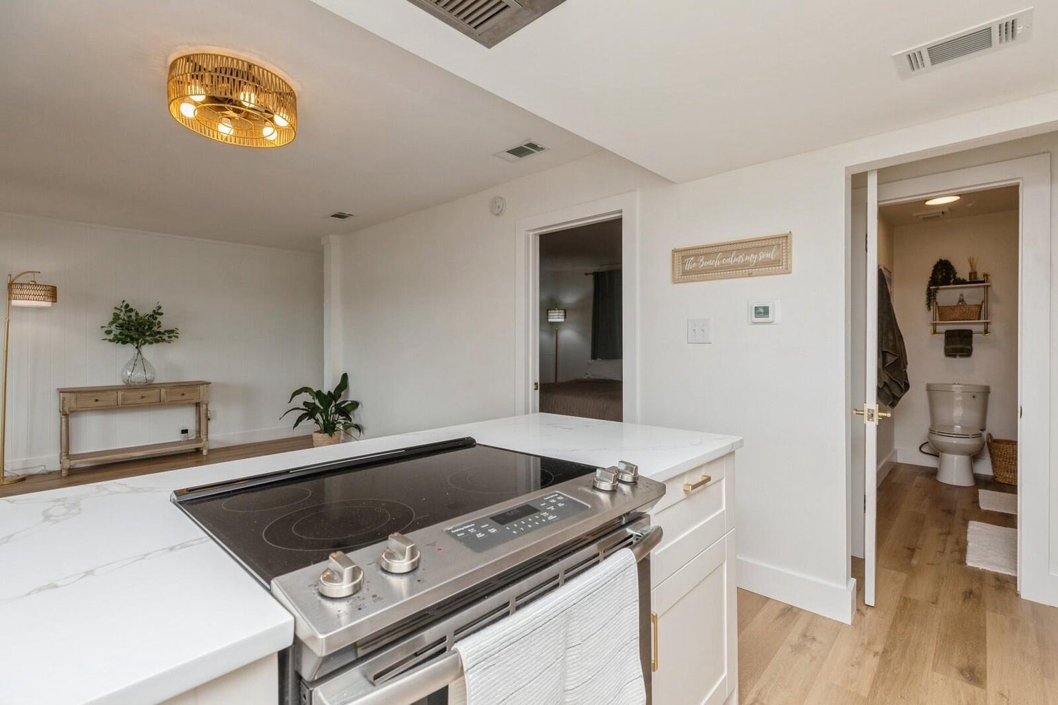 Updated stainless appliances with needed cooking supplies