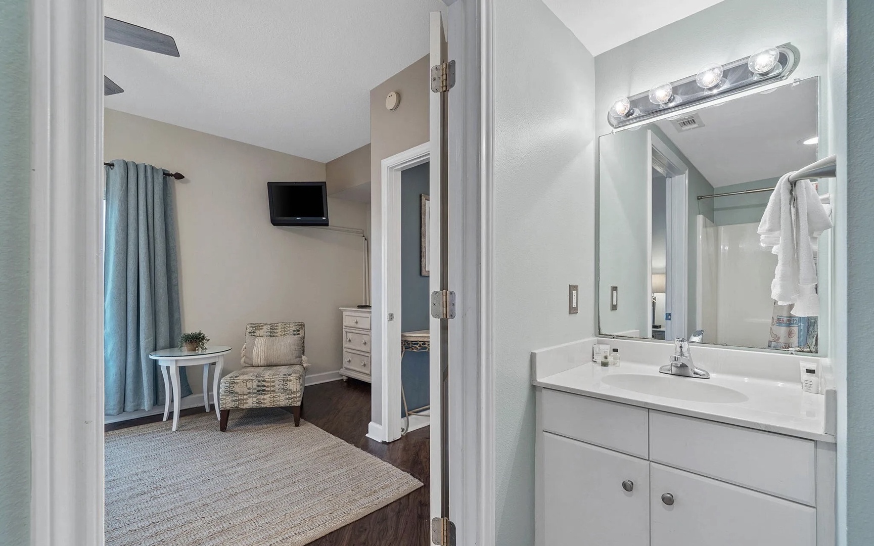 Primary bathroom with shower and tub combo.