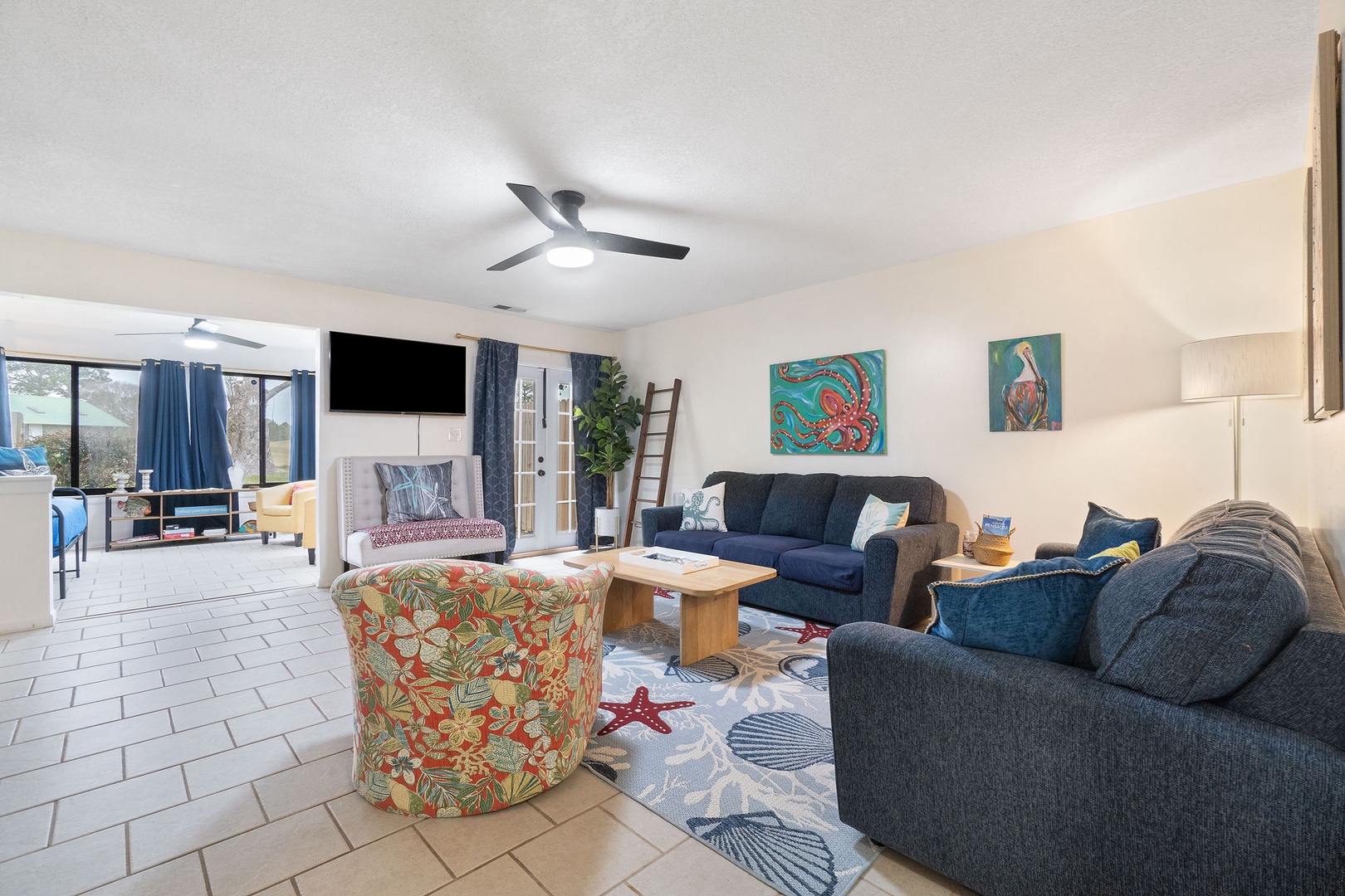 Open concept living area with TV