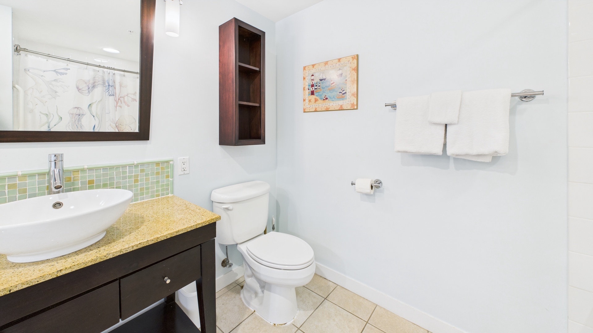Ensuite master bathroom with dual vanity and shower/tub combo