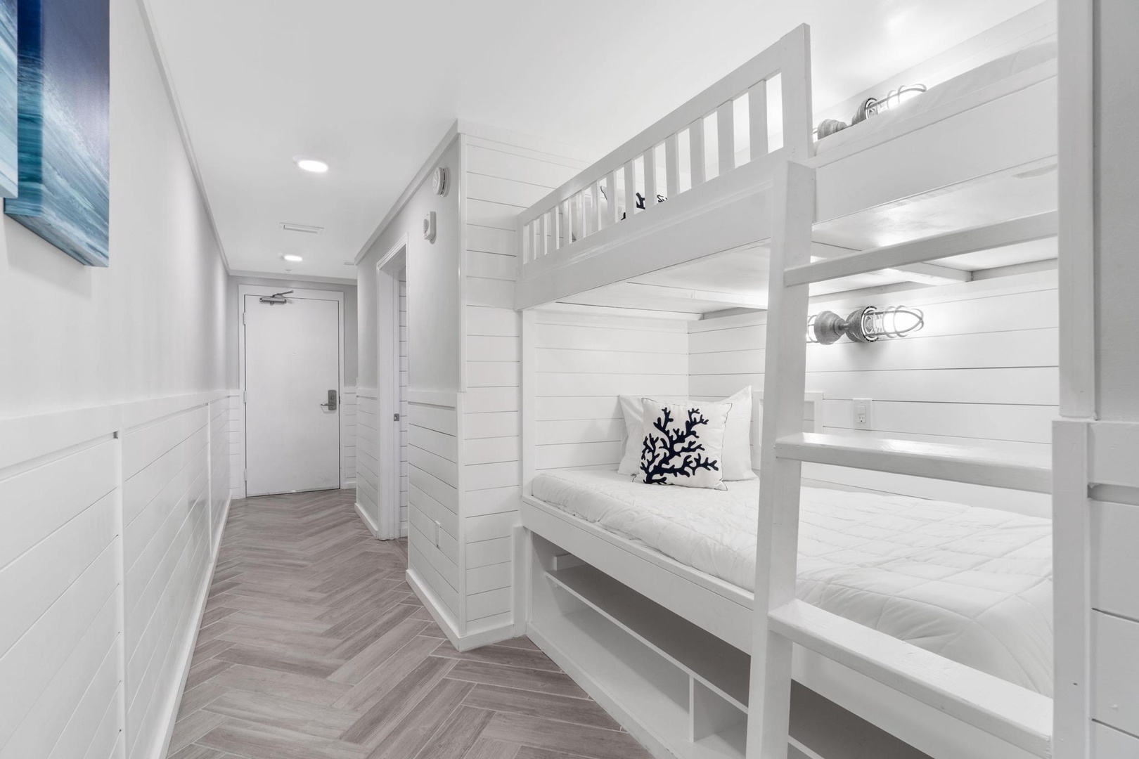 Twin bunk beds in hallway area