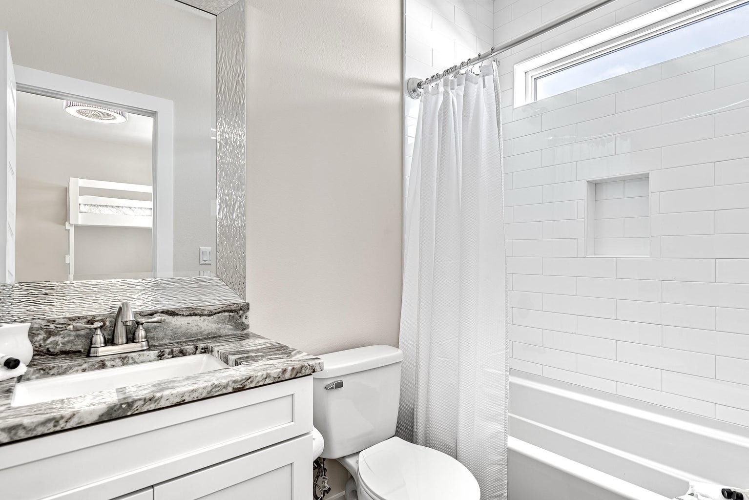 Bathroom with shower and tub combo
