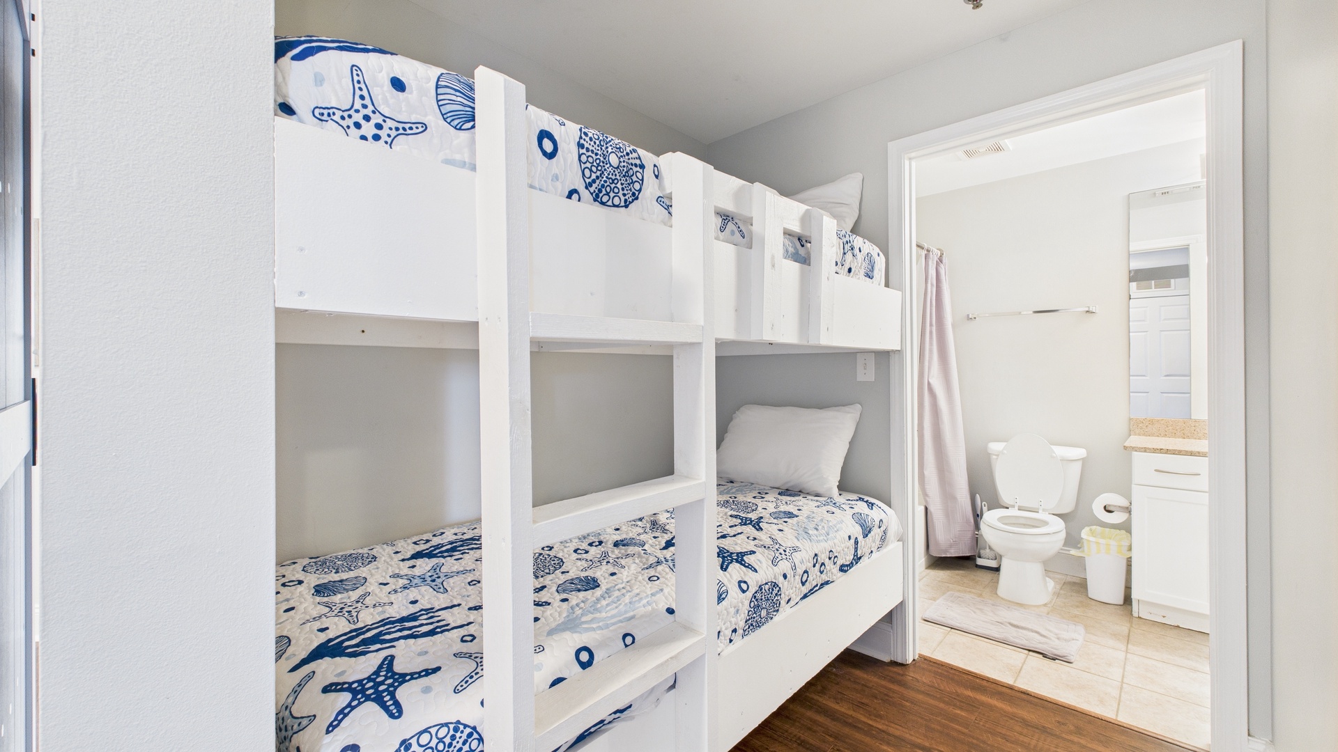 Twin-over-twin bunk bed in hallway nook