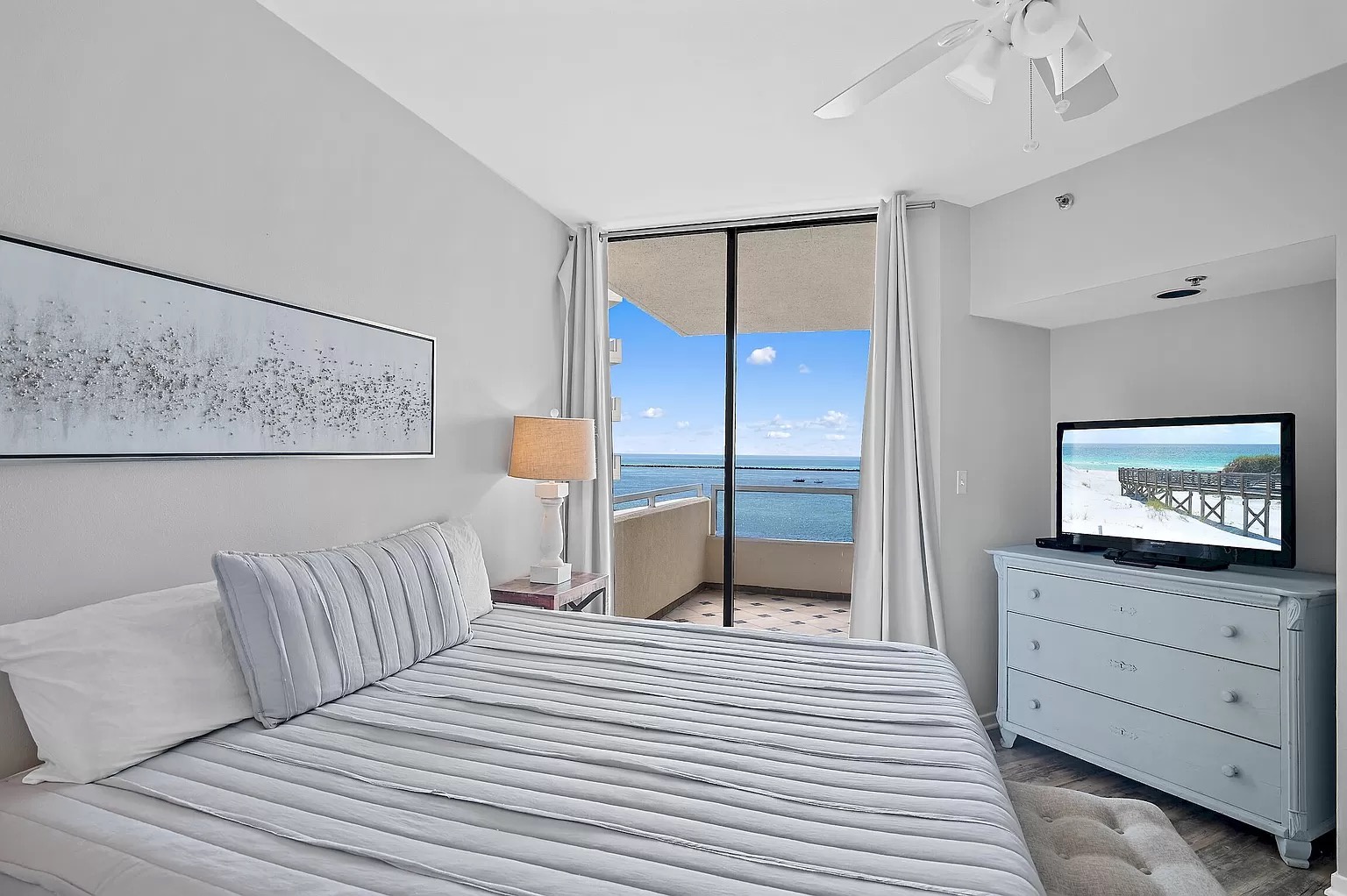 Master bedroom with king bed and access to balcony (sleeps 2)