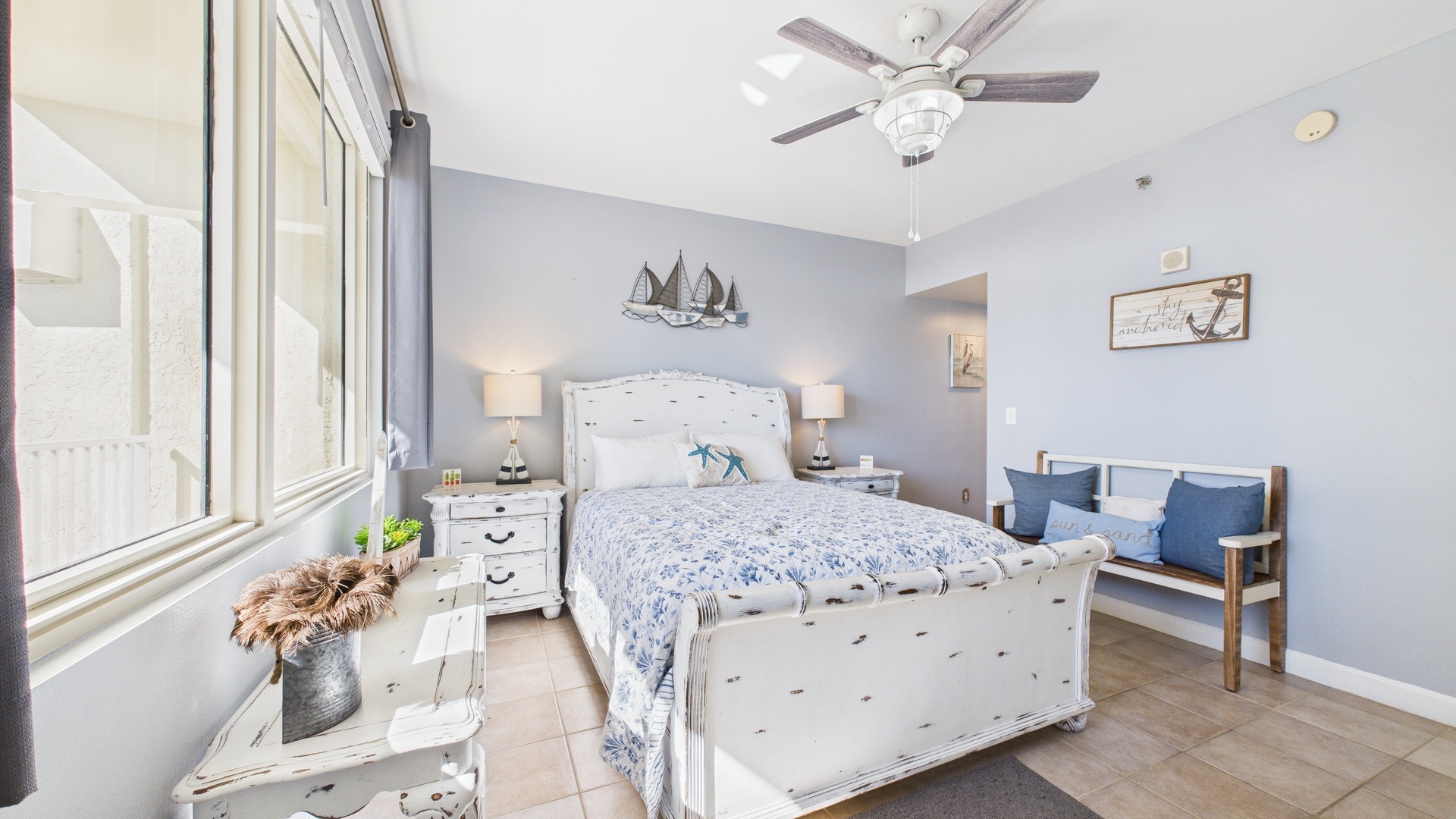 Master bedroom with queen bed TV and ensuite bathroom