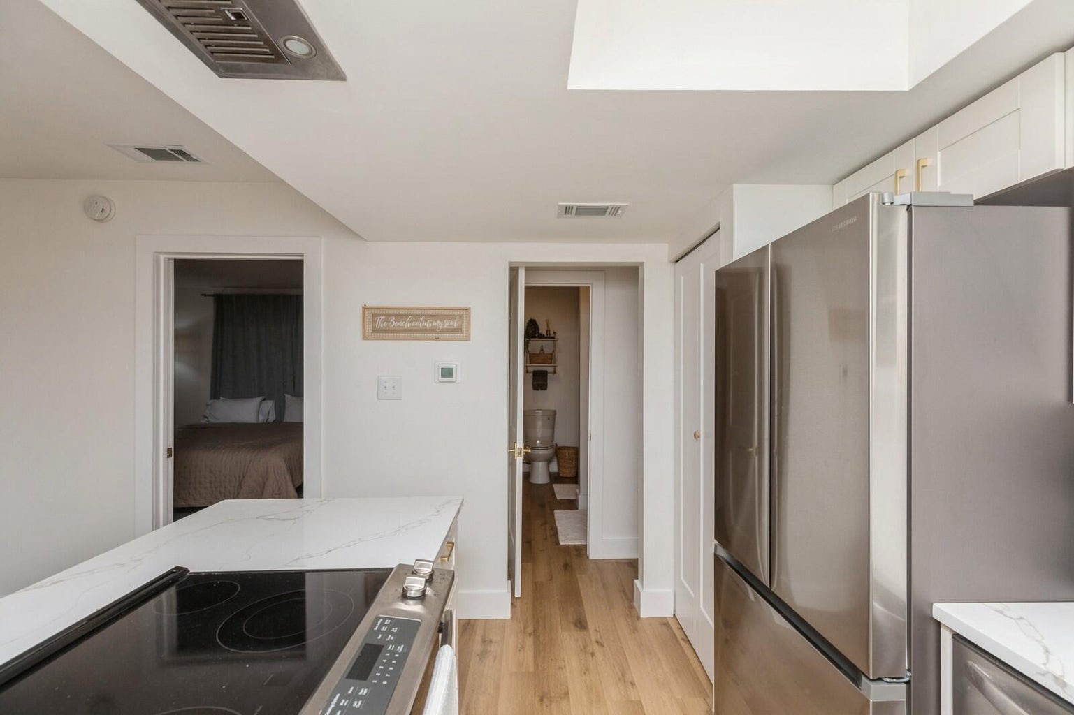 Updated stainless appliances with needed cooking supplies