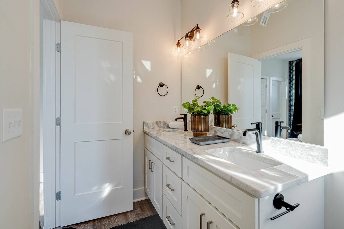 5627 - Primary bathroom with stand in shower and dual vanity