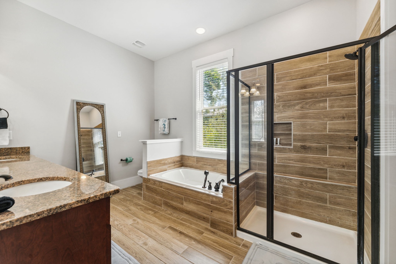 Master Bathroom with tub and stand up shower