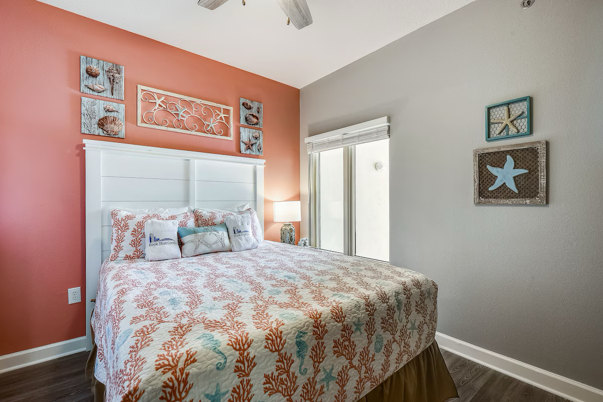 Second guest bedroom with queen bed TV and ensuite bathroom