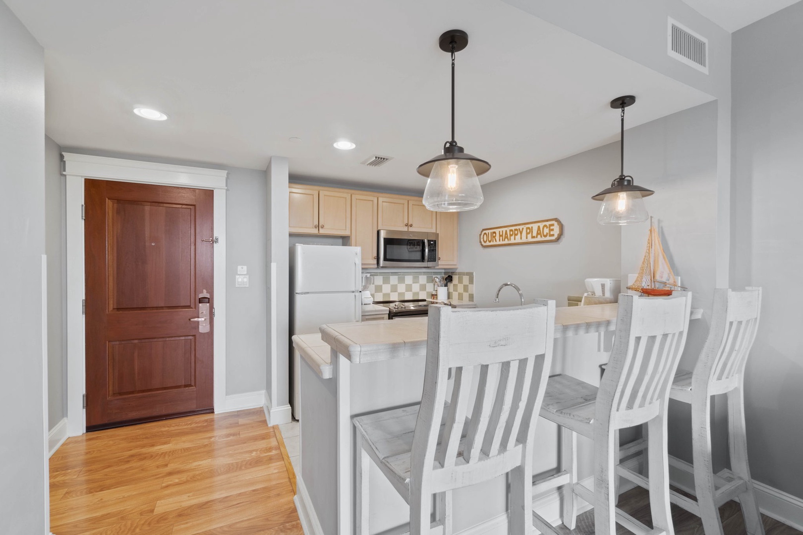 Kitchen area with bar seating