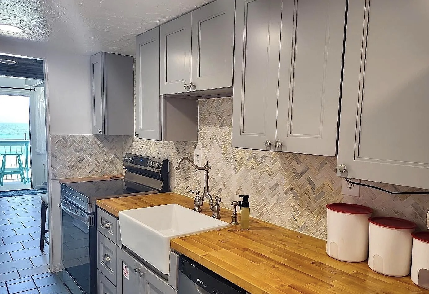 Full kitchen with updated appliances and cooking essentials