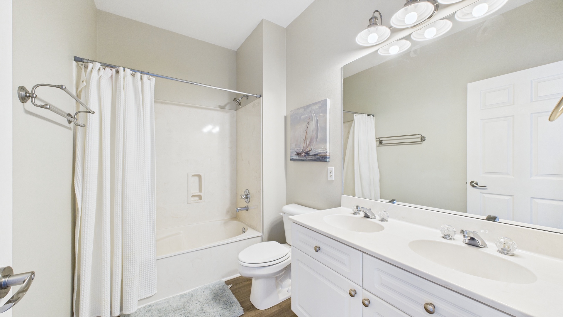First full bathroom with shower and tub combo