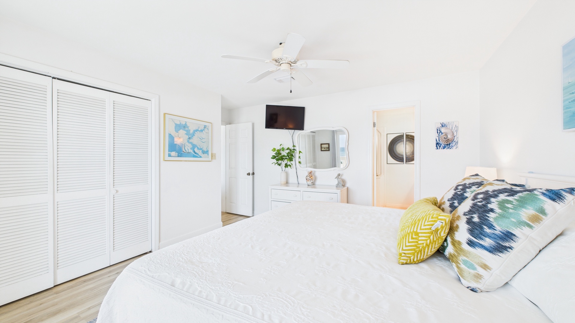 Master bedroom with king bed TV ensuite bathroom and balcony access