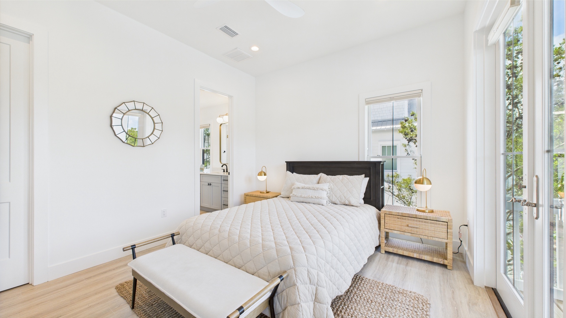 Third bedroom with queen bed TV and shared ensuite bathroom