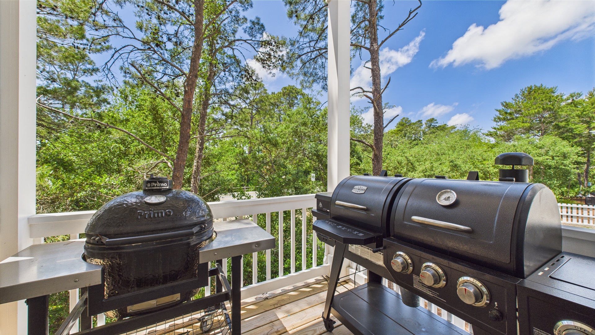 Terrace on first floor with dining table and grills
