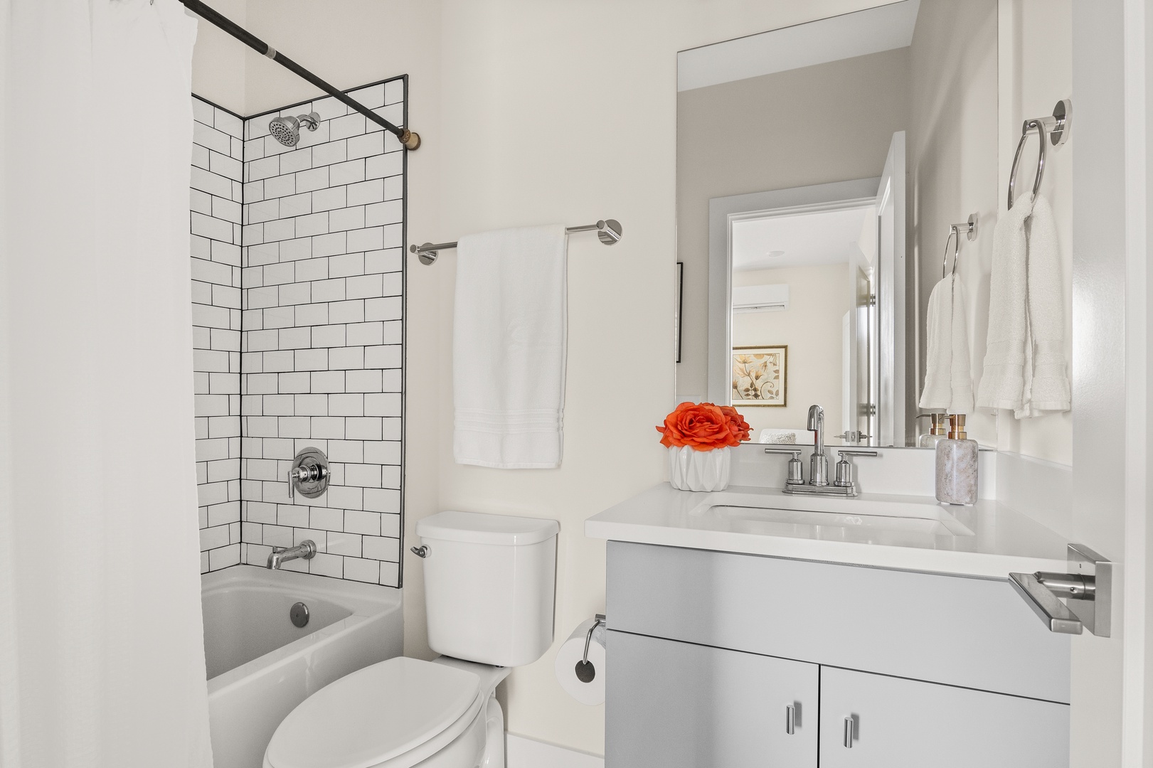 Downstairs Bathroom with tub and shower