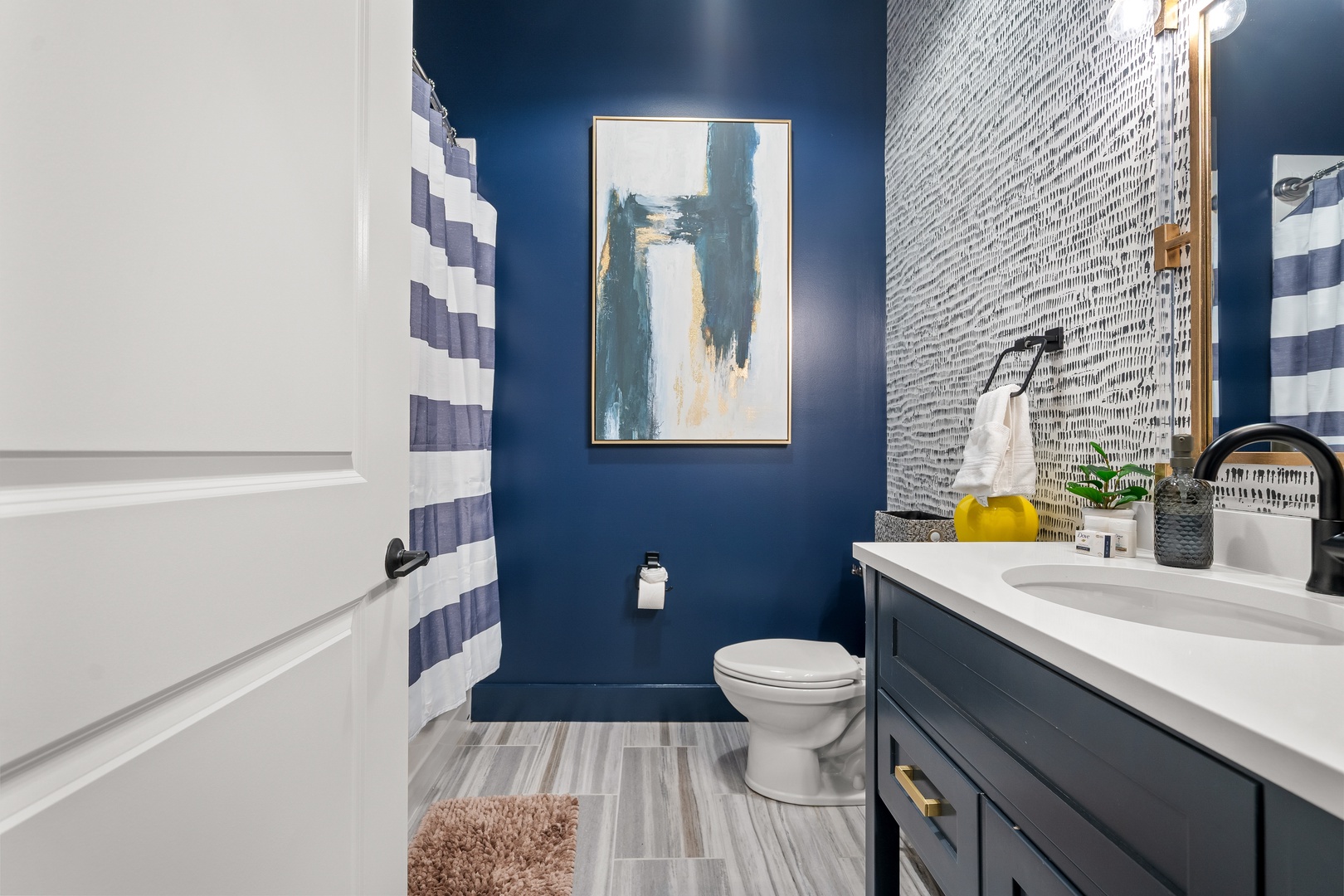 Second full bathroom with shower and tub combo