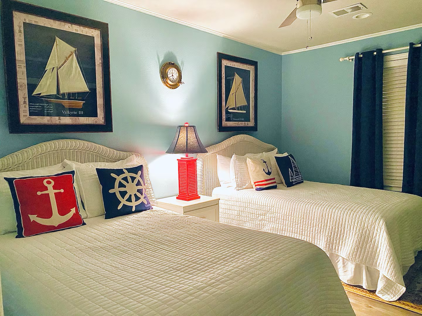 Guest bedroom with two full beds TV and ensuite bathroom