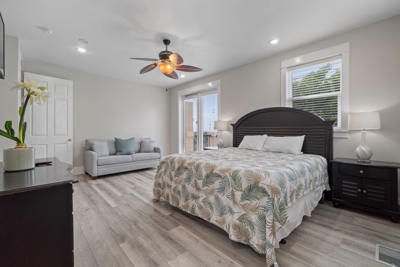3rd floor bedroom with a king bed and queen sleeper sofa