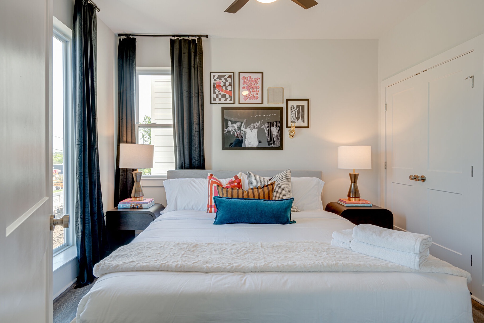 4th bedroom with King bed, designer furnishings, closet, and en-suite bathroom.