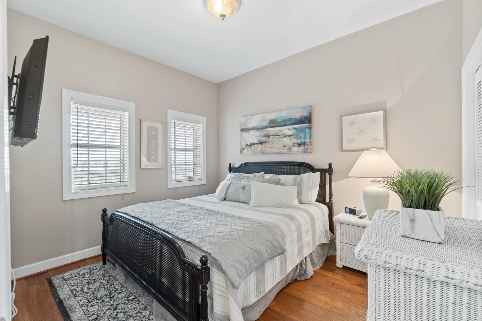 Guest room with king size bed and a 42” TV