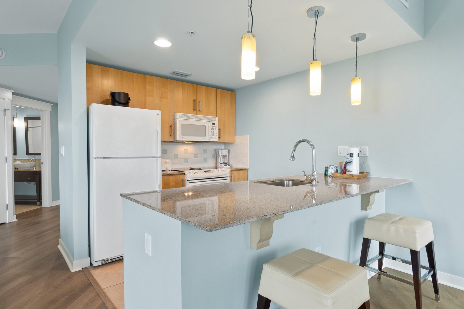 Kitchen area with bar seating