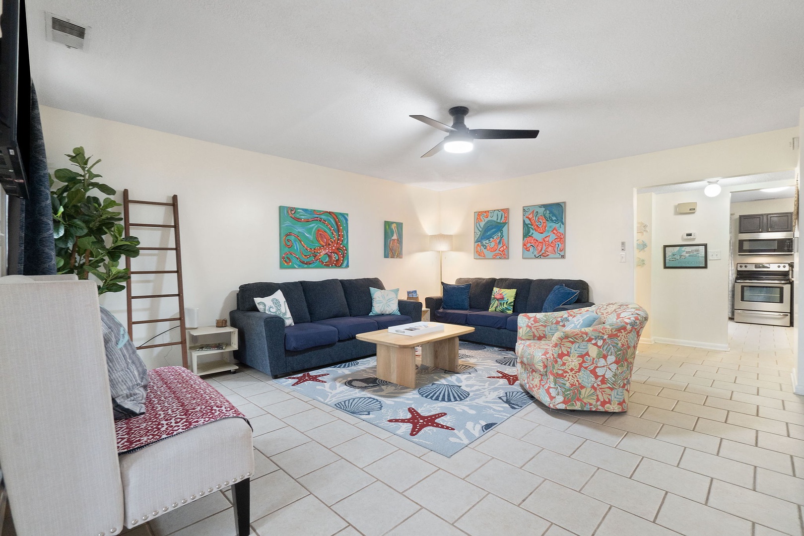 Open concept living area with TV
