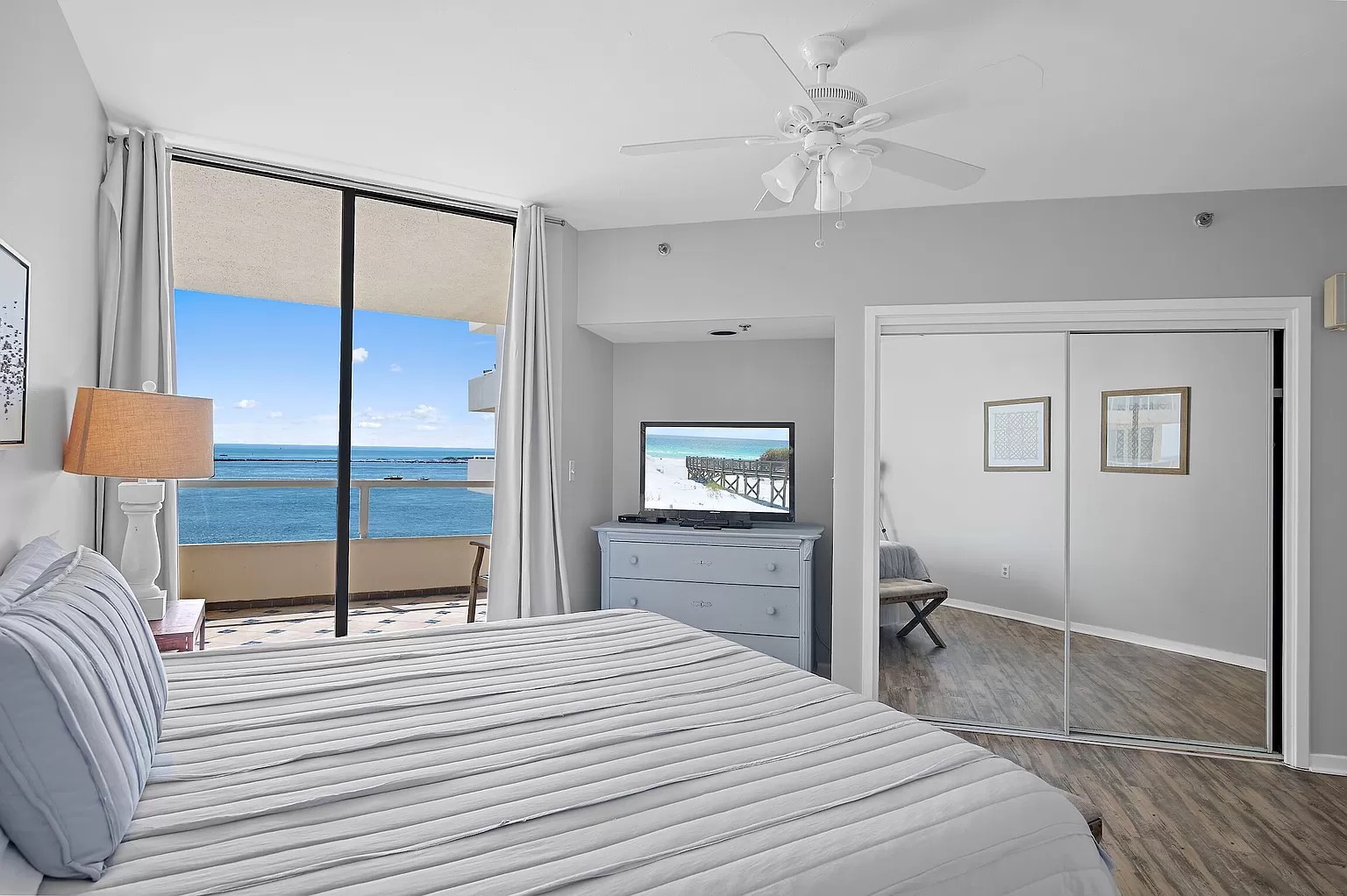 Master bedroom with king bed and access to balcony (sleeps 2)