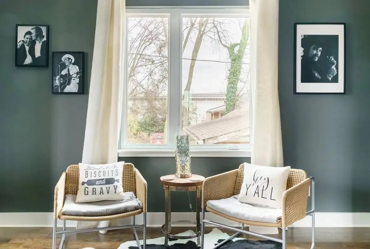 Living area with stylish furnishings TV and sofa bed