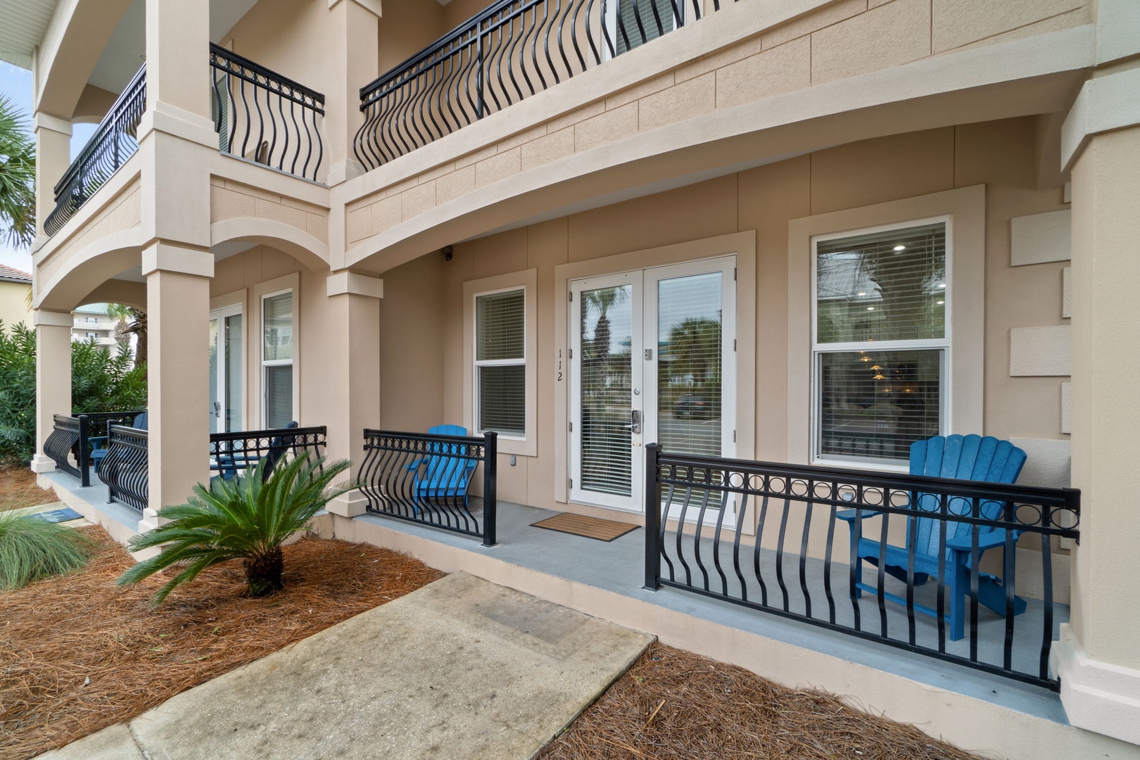 First floor balcony that is the entrance to the house