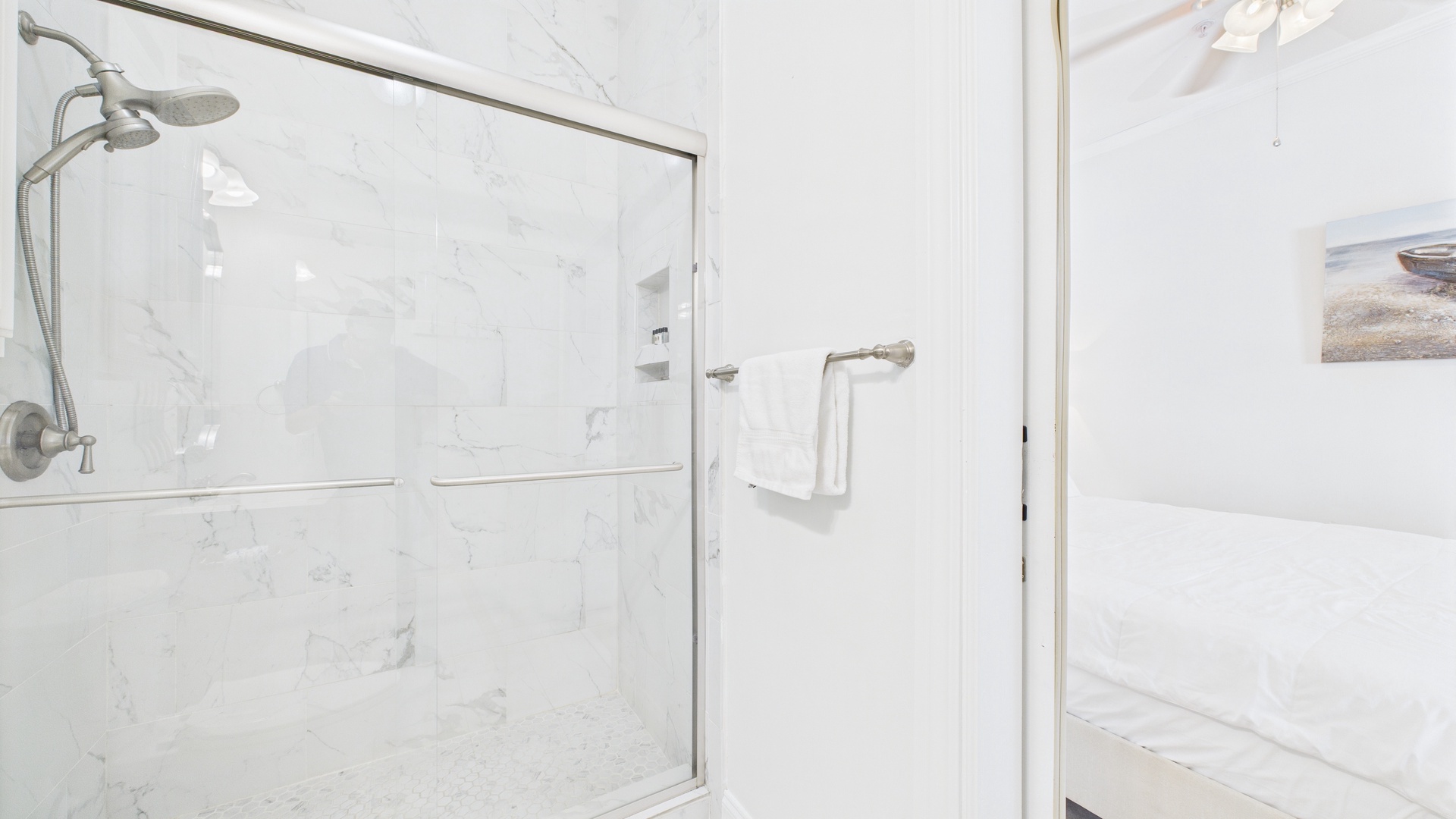 Bathroom with beautiful walk in shower and vanity