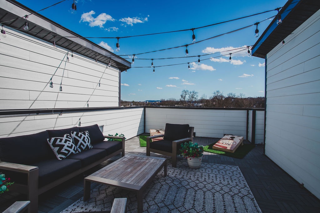 Private rooftop deck with ample seating
