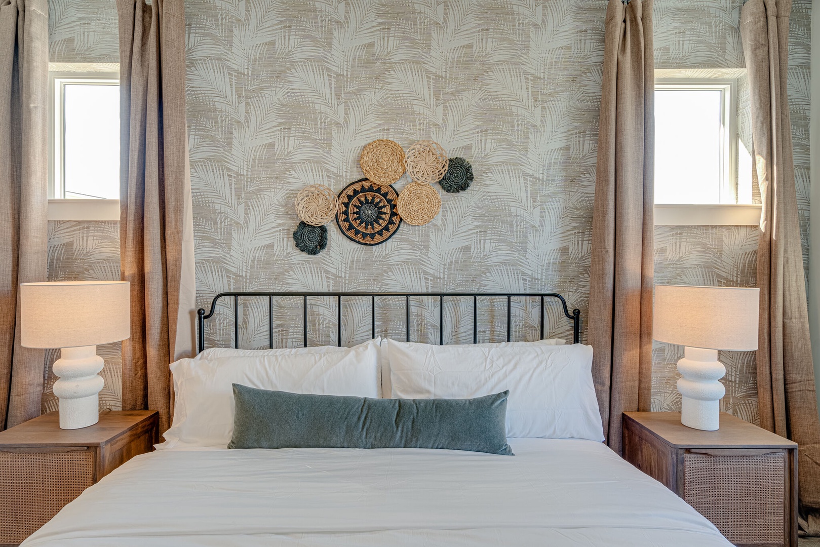 Primary Bedroom featuring a King bed, flat-screen SMART TV and designer furnishings with ensuite primary bathroom.