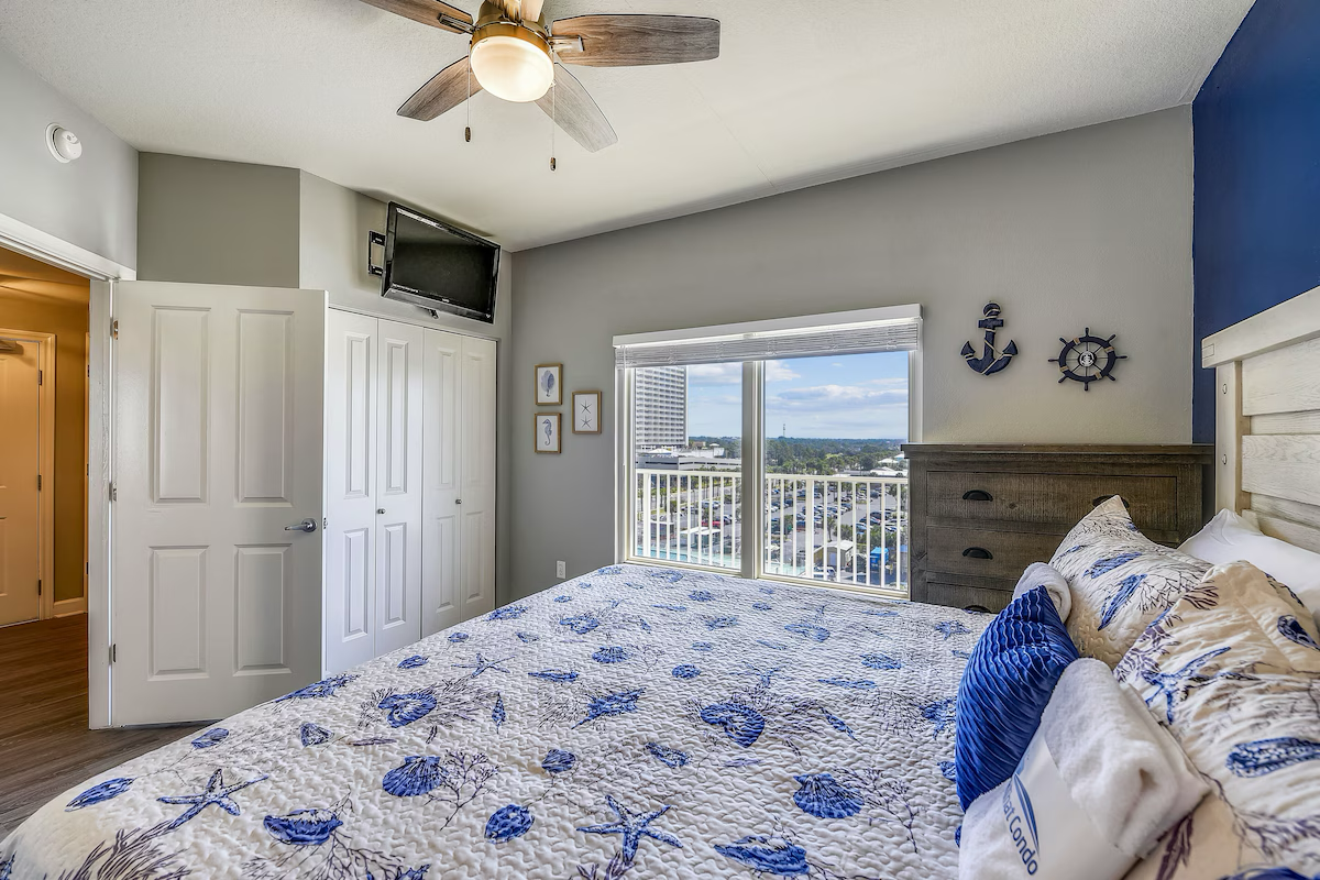 Guest bedroom with king bed TV