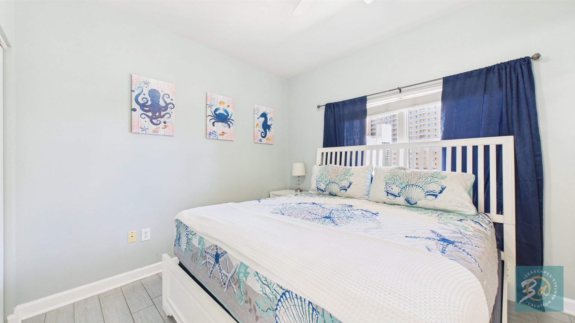 Guest bedroom with queen bed TV and ensuite bathroom