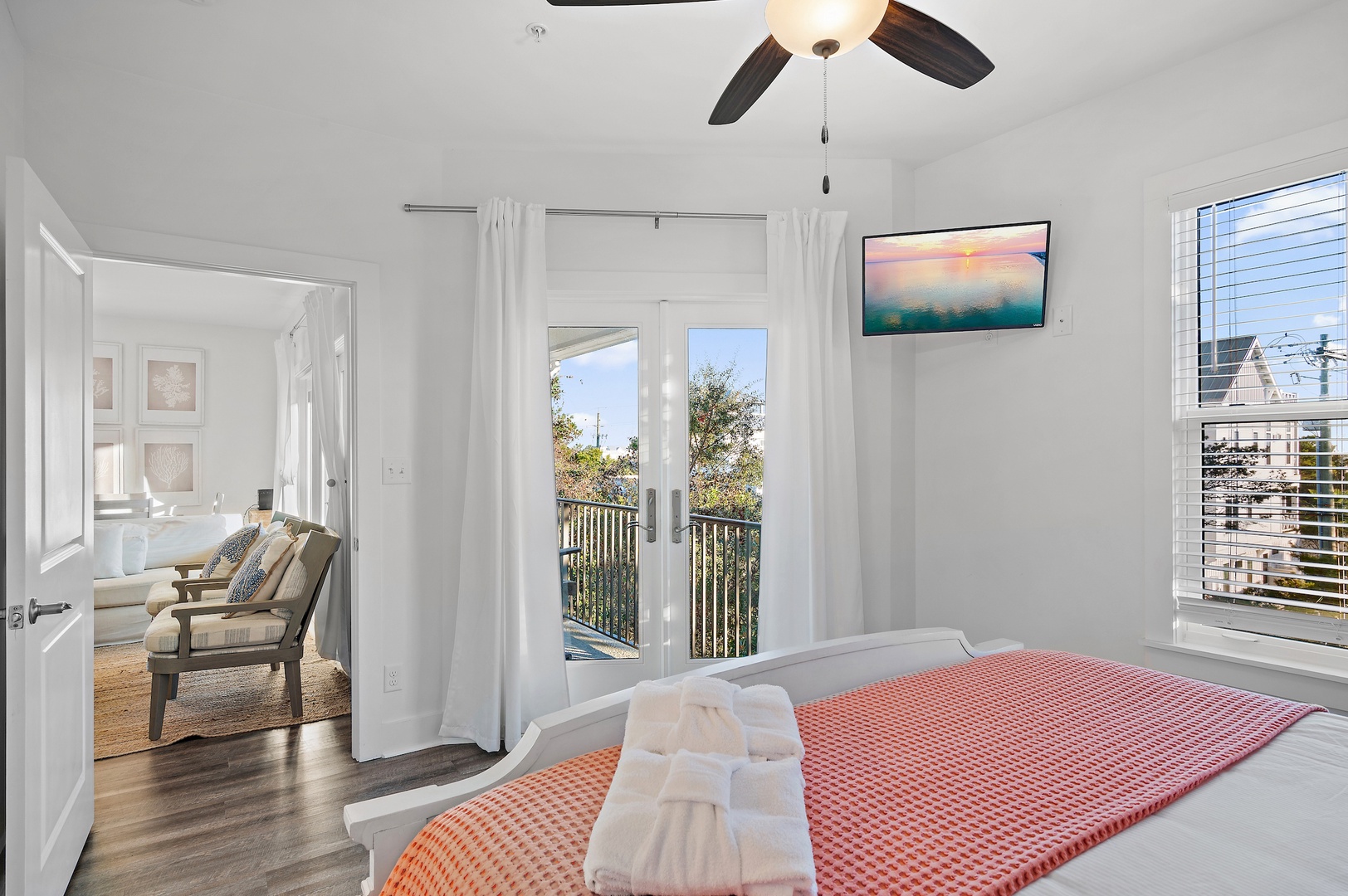 Queen bedroom with balcony access