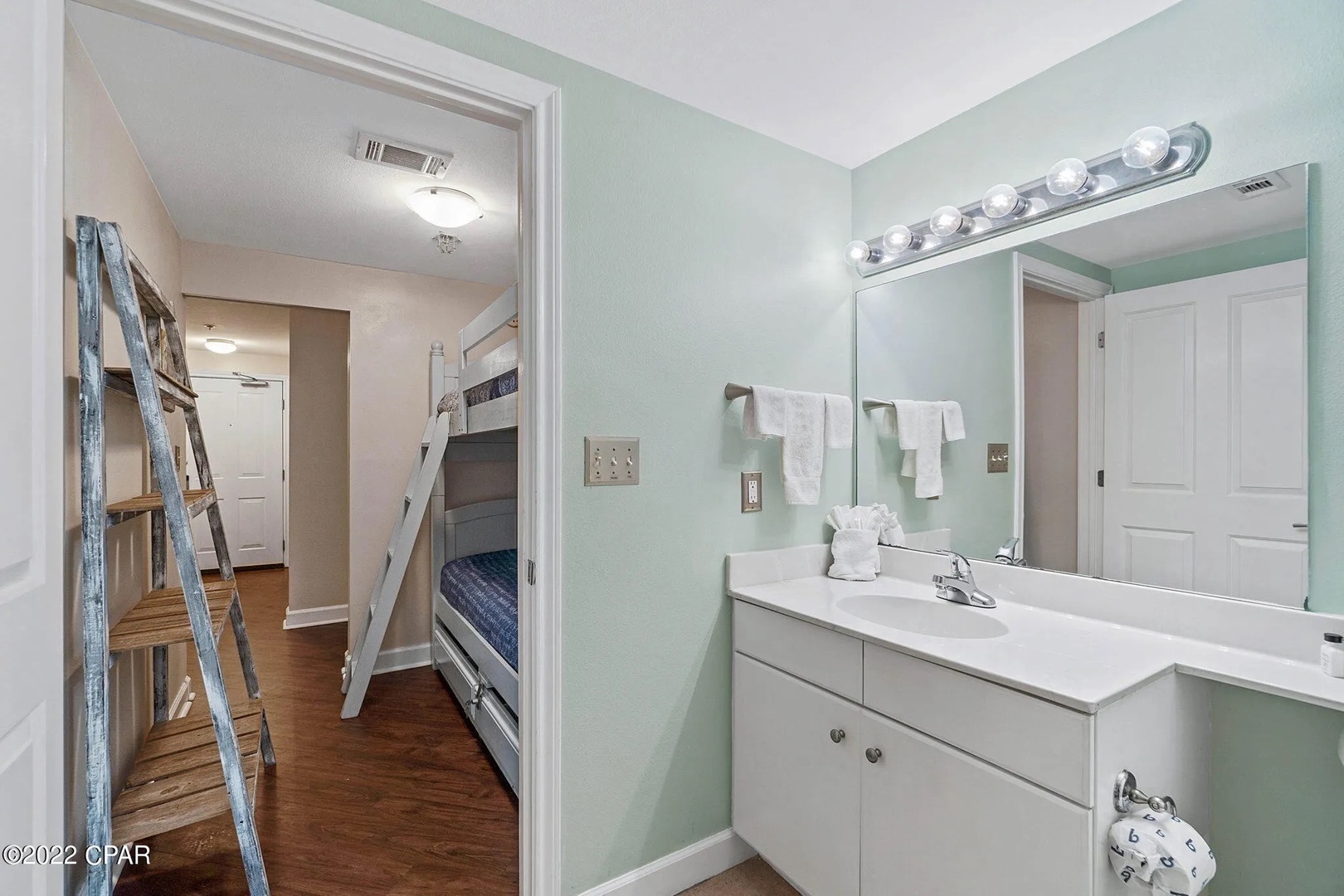 Third bathroom with shower and tub combo.