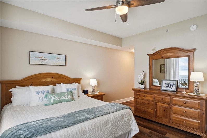 Primary bedroom with king bed and ensuite bathroom